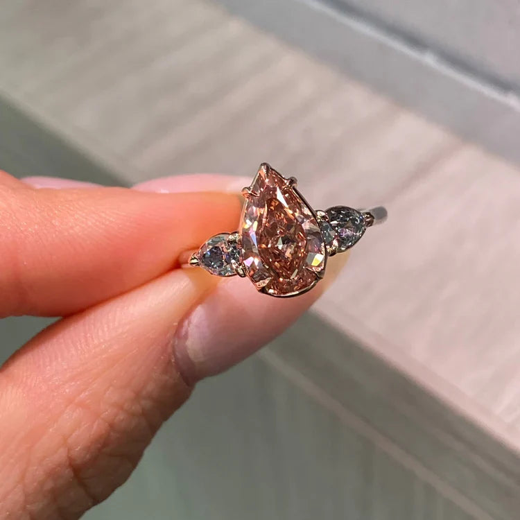 2.22ct Fancy Deep Brown-Pink Pear Diamond VS2 GIA Ring with Blue Diamond Sides — view 3 — Laura Milman New York