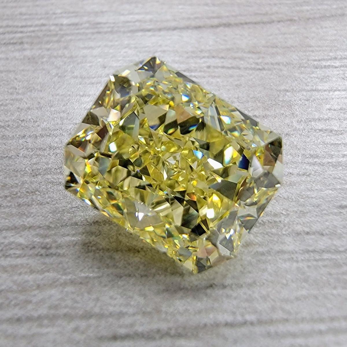 4.05ct Fancy Intense Yellow Elongated Radiant Diamond Ring VVS1 GIA — view 3 — Laura Milman New York