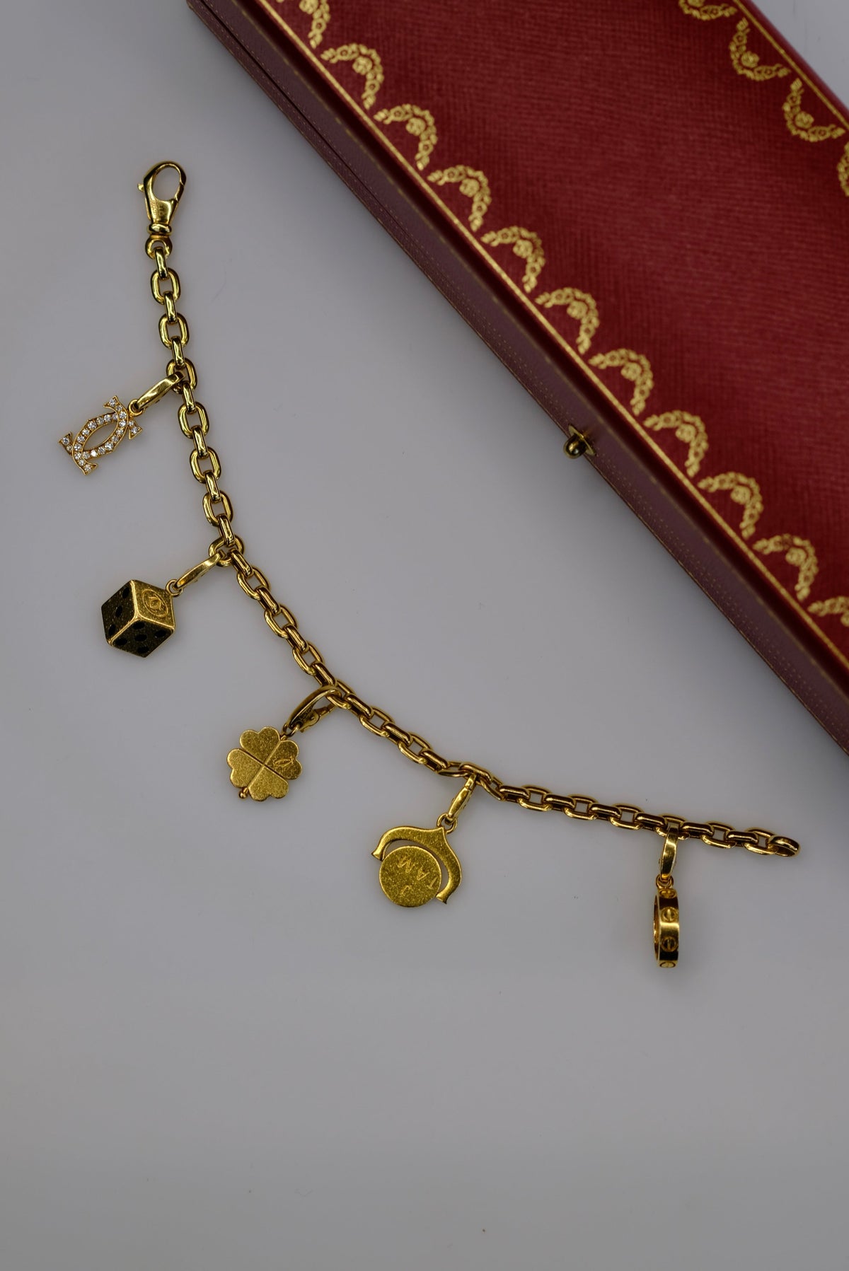 Cartier 18K Yellow Gold Five Charms Bracelet — view 7 — Laura Milman New York