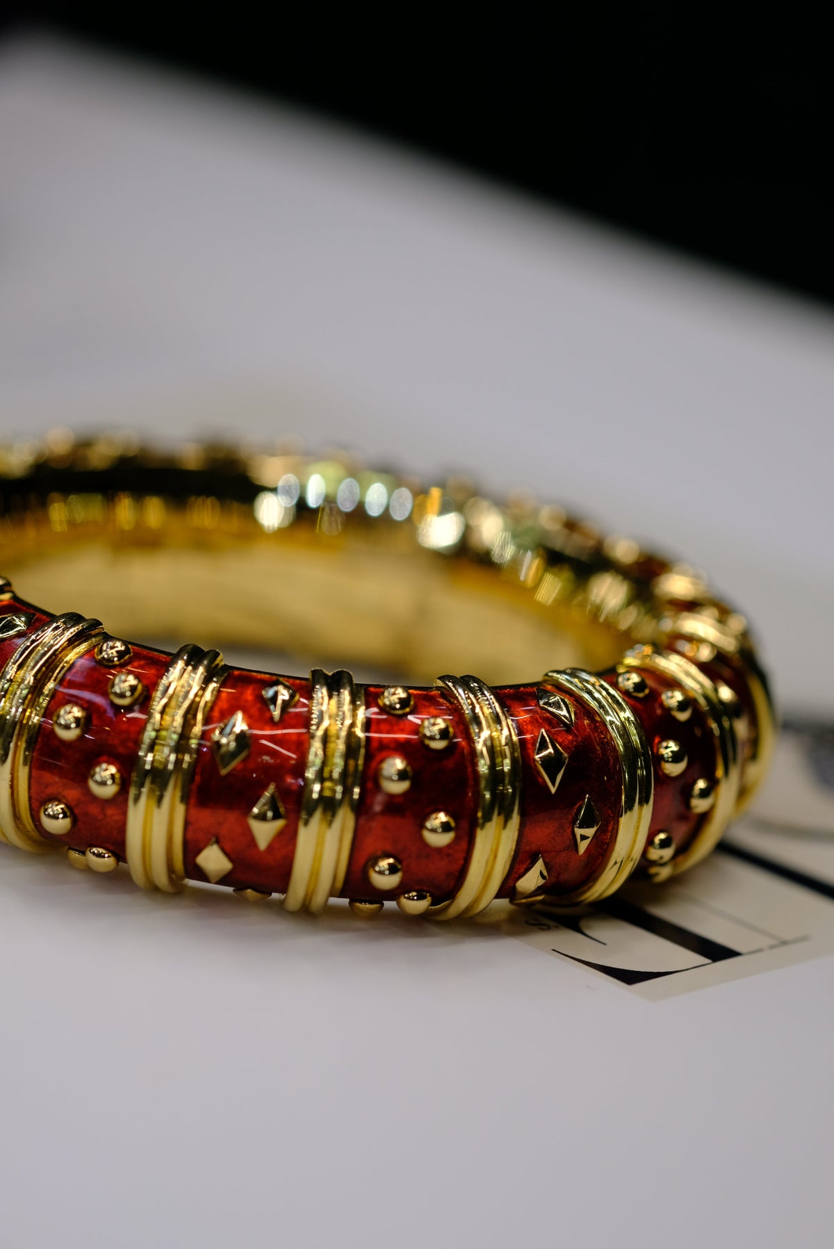 Tiffany & Co. Schlumberger 18K Yellow Gold Dot Losange Red Enamel Bangle Bracelet — view 9 — Laura Milman New York
