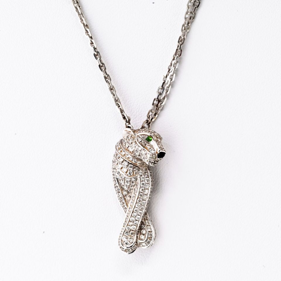 Cartier Panthere Necklace in 18K White Gold with Diamonds, Onyx, and Emeralds