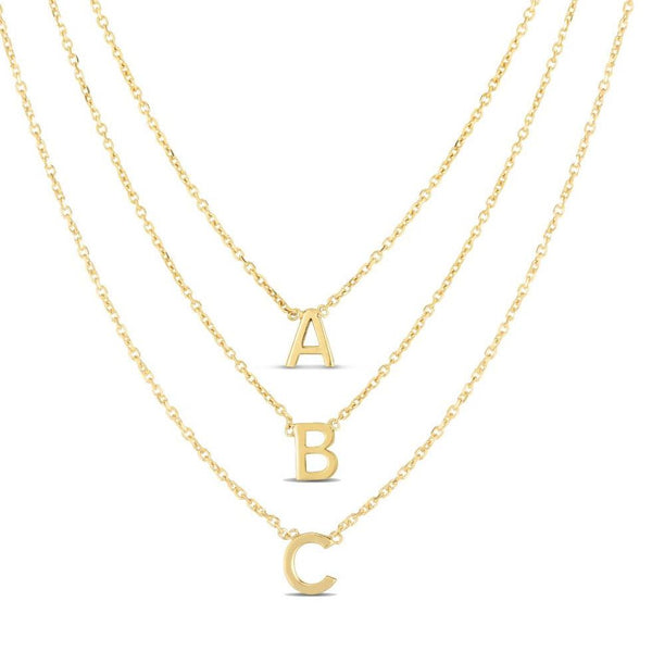 14K yellow gold mini initial necklaces, all letters