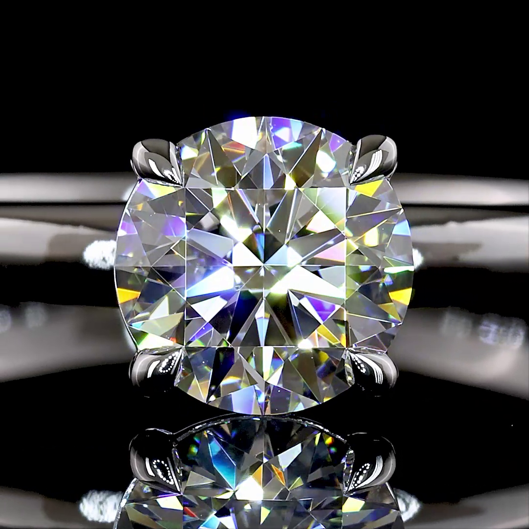 Round Solitaire setting design reference in 14K white gold; pictured center diamond is not included — Laura Milman New York