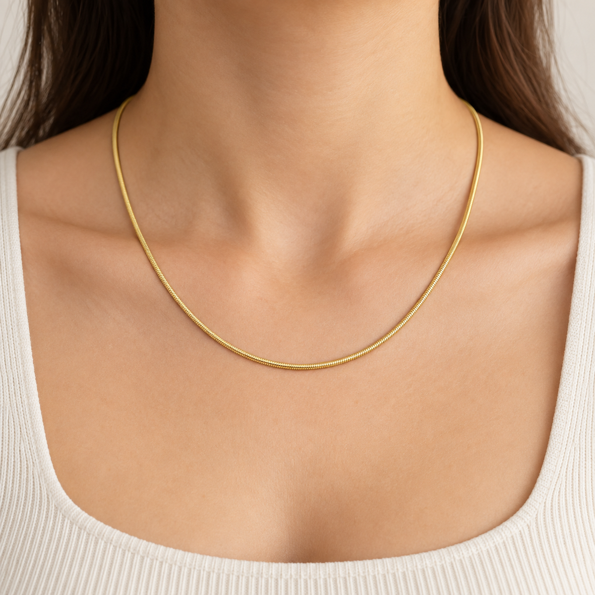 2mm Snake Chain Necklace in 14K Yellow Gold — on-body view — Laura Milman New York