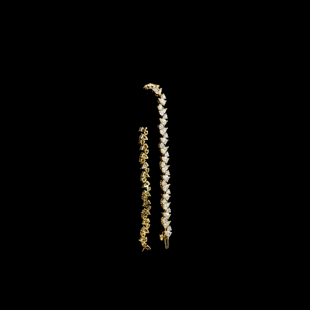 5.8 CT Pear Lab Grown Diamond Tennis Bracelet in 14K Yellow Gold – worn on wrist — Laura Milman New York