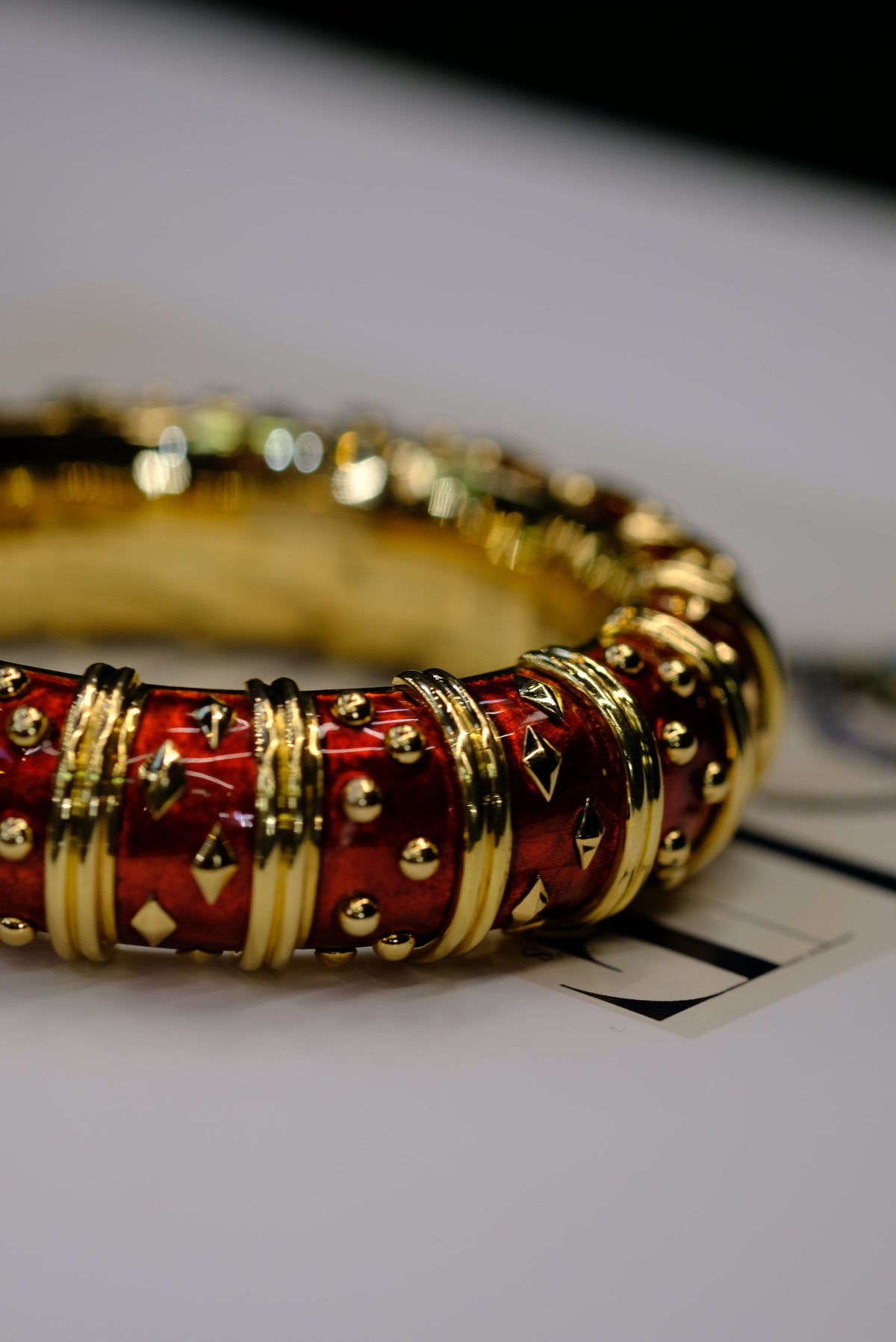 Tiffany & Co. Schlumberger 18K Yellow Gold Dot Losange Red Enamel Bangle Bracelet — view 8 — Laura Milman New York