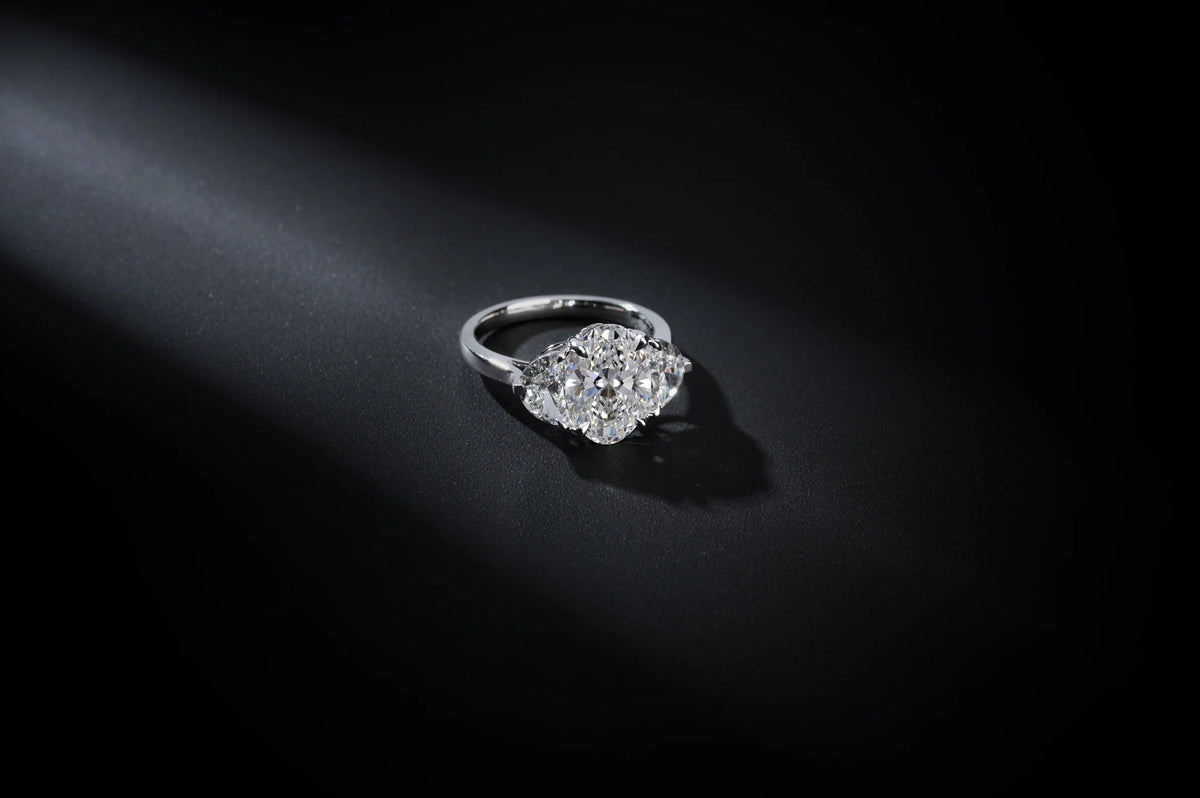 Oval and half-moon setting in white gold, reference view 3; pictured center diamond excluded — Laura Milman New York