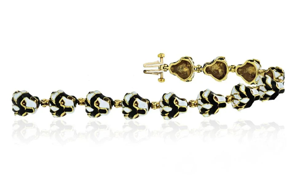 David Webb Lion Head Platinum & 18K Yellow Gold 12 One Line Black Enamel Head Motifs Bracelet — view 3 — Laura Milman New York