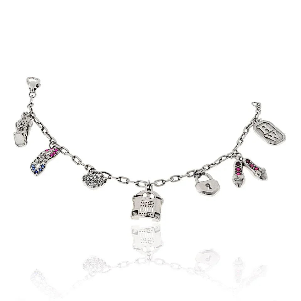 Harry Winston Platinum 7 Charm Vintage Bracelet — Laura Milman New York