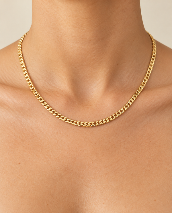 4.5mm Cuban Chain Necklace in 14K Yellow Gold — on-body view