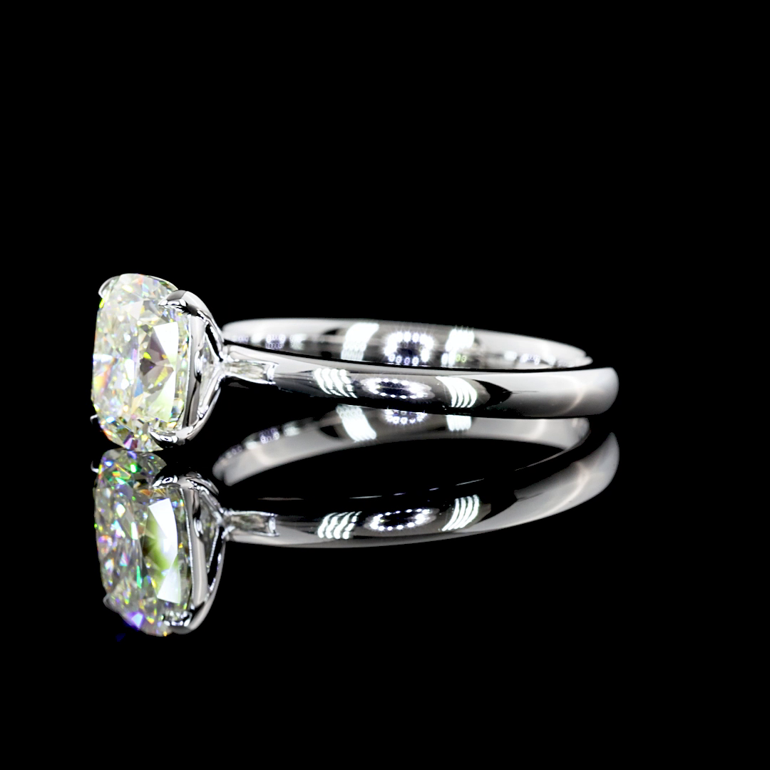 Elongated Cushion Prong Solitaire setting design reference in 14K white gold; pictured center diamond is not included — Laura Milman New York