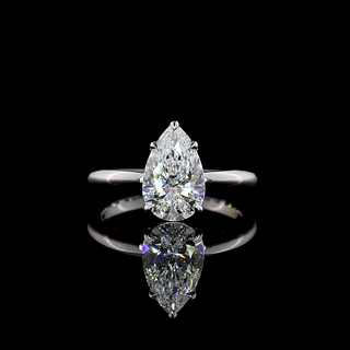 Pear Solitaire setting design reference in 14K white gold; pictured center diamond is not included