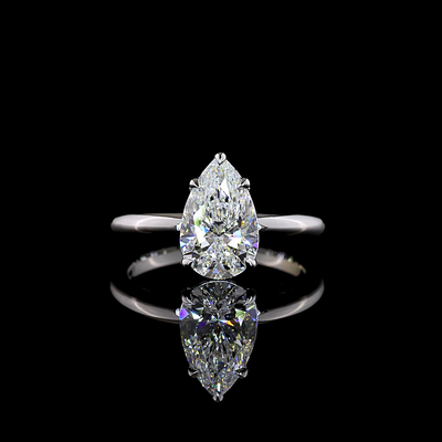 Pear Solitaire setting design reference in 14K white gold; pictured center diamond is not included