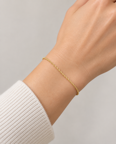 1.8mm Rope Chain Bracelet in 14K Yellow Gold — on-body view