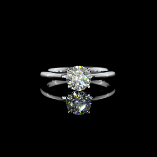Round Solitaire setting design reference in 14K white gold; pictured center diamond is not included
