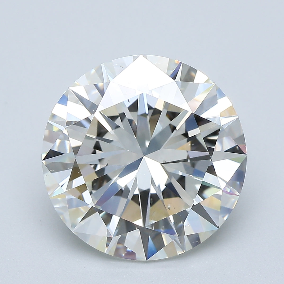 6.09ct Round, J SI1 — GIA